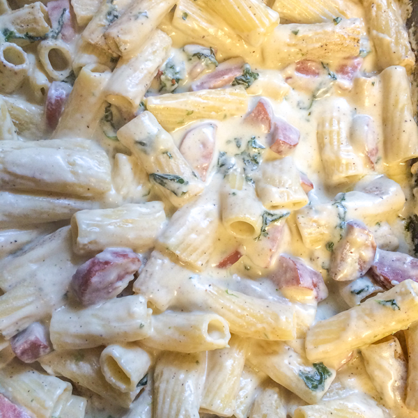 Creamy Baked Rigatoni with Bechamel Sauce and Garlic Sauteed Spinach